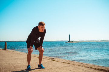 young guy resting after workout