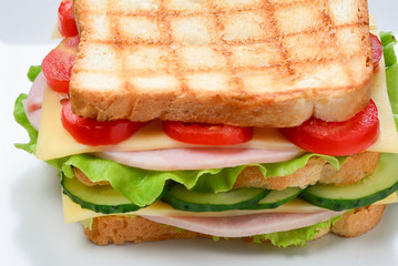 Sandwich bread tomato, lettuce and yellow cheese