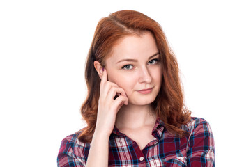 Fototapeta premium Close-up portrait of a beautiful red-haired girl
