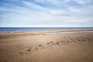 Skyline of Baltic sea. Empty sandy beach.