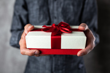 Man holding a present box