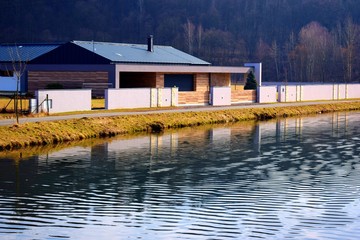 House reflected in water