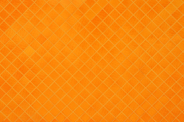 Orange mosaic texture and background.
