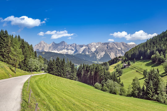 Winding mountain road view on Dachstein massif, Austria