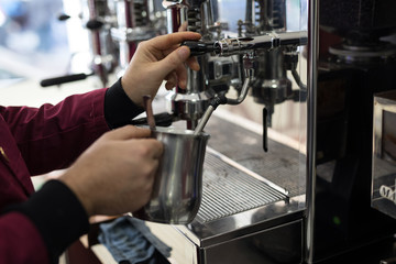 Espresso coffee in Italian bar with cappucino and coffee machine