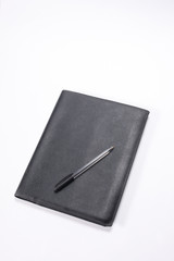 black closed agenda isolated on white background