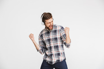Portrait of a happy young man in plaid shirt