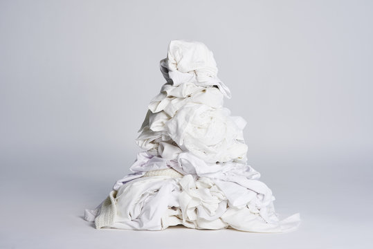 Laundry heap on the grey background