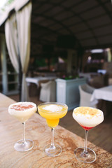 cocktails in the background of the restaurant.