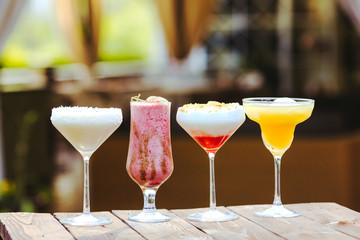 cocktails in the background of the restaurant.