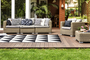 Rattan sofa on terrace - Powered by Adobe