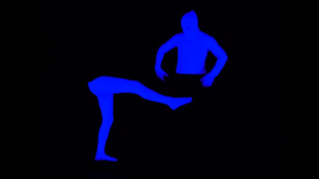 Ultraviolet Bottom and Top Halves - Legs and Torso Pantomime Interaction. Legs are Kick the Bounces Body. Monochrome - Blue on Black Scene in Black Light.