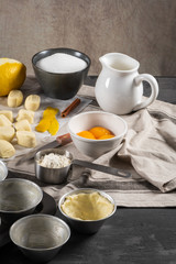 Obraz na płótnie Canvas Ingredients for homemade baking portuguese egg tarts. Traditional portuguese dessert pastel de nata