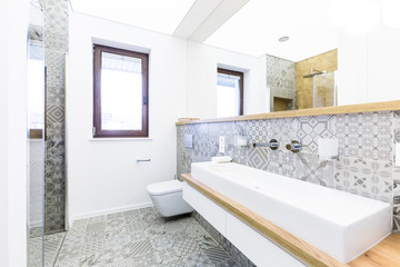 Modern bathroom with pattern tiles