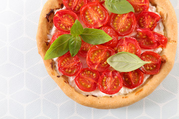 tomato quiche with cream and basil