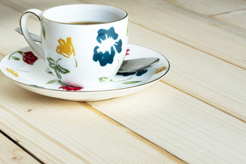 A cup of tea on wooden background