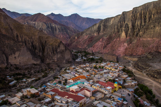 View of Iruya village and multicolored mountains in the surroundings at sunset, Salta province, Argentina, iruya - San Isidro - San Juan treeking