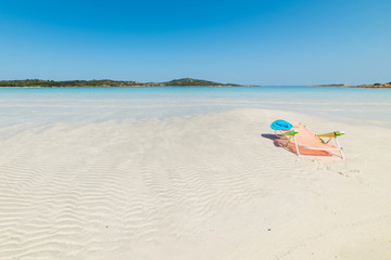 Fototapeta na wymiar beach chair on the sand