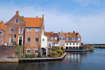 Monumental houses at quay in Enkhuizen, the Netherlands.