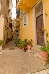 Fototapeta na wymiar corfu island city, alleys houses buildings , Greece