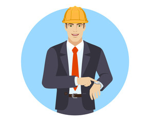 Businesswoman in construction helmet pointing at his watch