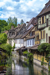 Fototapeta na wymiar Amazing traditional old houses in a small town Colmar in France 