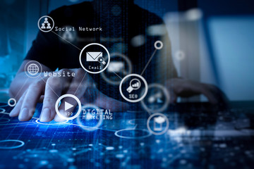 top view of businessman hand working with modern technology and digital layer effect as business strategy concept