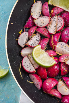 Spring season radish fried on pan with poopy seed