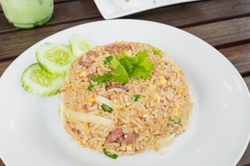Fermented port fried rice on the white plate,Thai food.