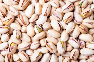 Pistachios background. Pistachio texture. Nuts. Top view