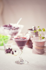 Cocktail of currant fresh berries on the table