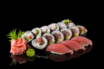 Sushi set isolated on the black background.