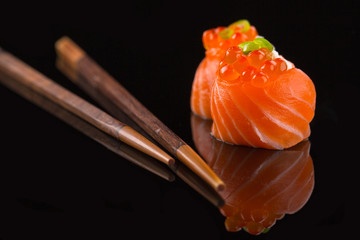 sushi on the black background