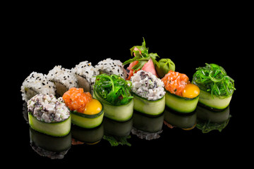 sushi set isolated on the black background