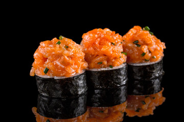 sushi rolls isolated on the black background
