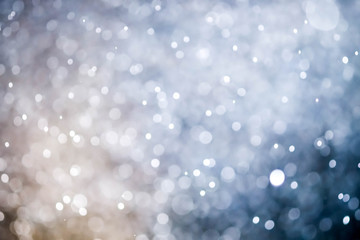 Christmas blur bokeh background texture abstract light glittering stars on bokeh. glitter vintage lights background