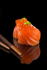 sushi on the black background