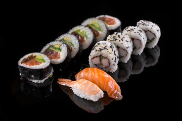 sushi on the black background