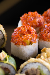 sushi on the black background