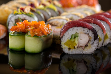 sushi on the black background