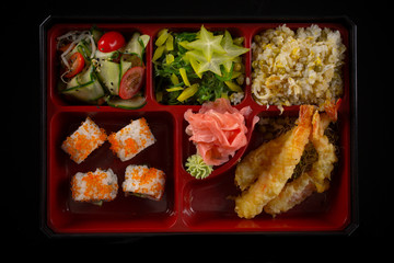 sushi lunch set isolated on the black background