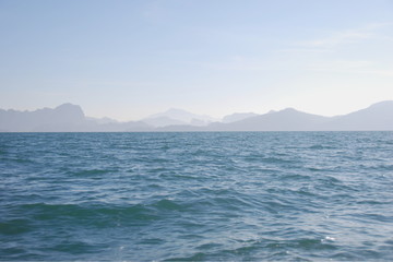 Fototapeta na wymiar Seascape with rock in the background
