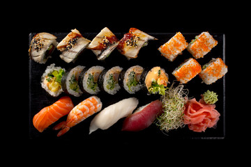 sushi on the black background