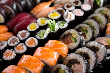 large sushi set on the black background