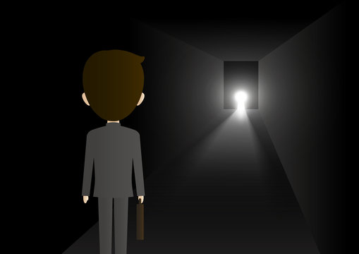 Business solution concept design of businessman walking at keyhole shape door in dark room