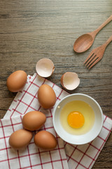 Fresh egg in bowl ready to cook