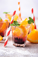 Summer  drink with orange and berries