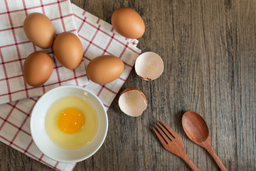 Fresh egg in bowl ready to cook