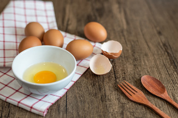 Fresh egg in bowl ready to cook