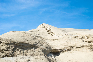 Rocky formation of sand and clay due to weathering